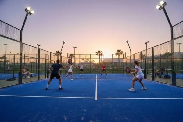 Close-up of artificial turf fibers and tempered glass connectors