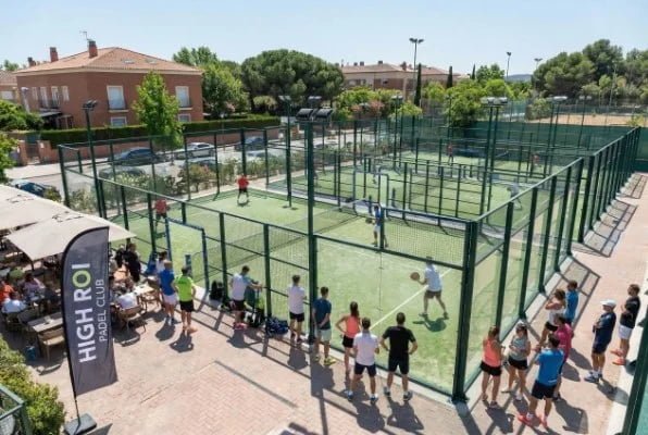 busy padel club with multiple courts occupied