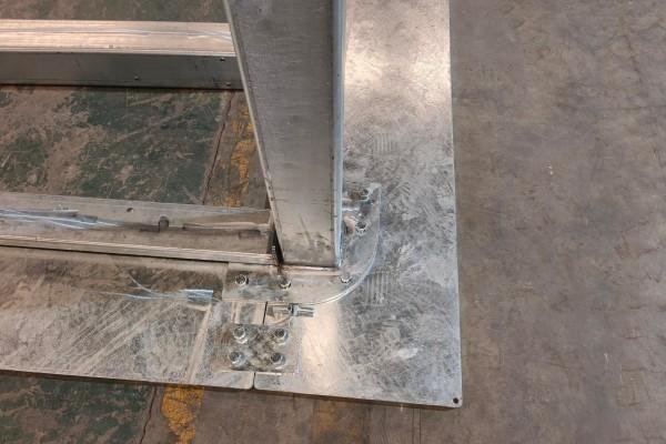 Heavy duty steel base frame for mobile padel courts